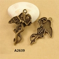 Antique bronze alloy goddess wing pendant shown from front and back view - A2639 Goddess with Wings and Snake