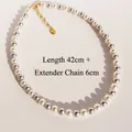 Ronde witte en zilvergrijze parelketting met gouden sluiting, lengte 42cm plus 6cm - 42cm+6cm Verlengketting / Grijs en Wit