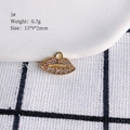 Detailed close-up of a lip-shaped pendant with pavé white rhinestones on a gold-plated base - 3# (Lips)
