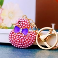 Pink pearl-beaded duck keychain with a purple bow and gold-plated hardware for bags - Purple Pearl Duck