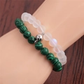 8mm beads magnetic couple bracelets with malachite and frosted stone on wood background - Malachite + Moonstone