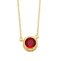 Elegant gold chain necklace featuring a round bezel-set dark red gemstone pendant - Red