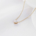 Collana a cuore minimalista dorata con zirconi trasparenti su catena a maglie fini - Oro 14K + Zircone Bianco