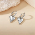 Polished silver heart-shaped pendant hoop earrings made of minimalist stainless steel - Hollow Heart / Steel