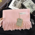 Pink cashmere feel scarf with fringe tassels and brand label in a stylish winter scene - 200x68cm / Light Pink