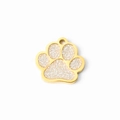 Golden paw-shaped pet ID tag with silver glitter inlay and high-polish finish - White