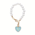 Detail of pearl cup charm chain with gold lobster clasp and blue heart letter Q pendant - Letter Q