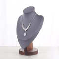 Silver rhinestone teardrop Y-necklace on gray velvet mannequin with walnut base - Medium / Gray