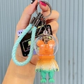 Orange to green gradient pixel astronaut bear keychain with blue braided strap - Block Bear-Yellow
