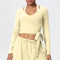Detail of V-neck wrap yoga top with cross tie hem and high-elastic brushed fabric - Light Yellow
