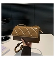 Close-up of chocolate brown quilted square bag featuring knotted strap and gold hardware - Brown