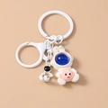 Cute white rabbit astronaut keychain with star-holding figure for bag decoration - Astronaut Bunny (1273)