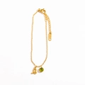 Gold stainless steel bracelet featuring a green gemstone and a letter B pendant charm - Leo