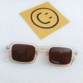 Retro rectangle sunglasses with transparent frame, brown lenses and gold rivet accents - Champagne