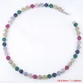 Detail view of floral cluster necklace with colorful stones and platinum-plated chain - Platinum Colorful Zirconia Necklace (VL526)