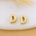 18K gold-plated minimalist letter D pendant accessory on a white display base - Gold Letter D