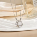 Detail of silver sun and moon pendant with pavé cubic zirconia and white enamel - Silver Enamel Star Moon Necklace Set XL0486G