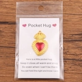 Golden ripple-edged Pocket Hug heart charm with red enamel and English blessing card - Gold Ripple Border Red Heart