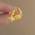 Detailed view of a gold-plated koi fish earring featuring an embossed matte scale texture - 187# Koi