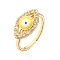 Detail of gold evil eye open ring featuring colorful zircon stones and drip oil texture - Adjustable Open / Yellow