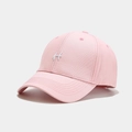 Close-up of pink baseball cap featuring white embroidered H letter and breathable eyelets - Adjustable / Pink