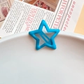 Sky blue star shaped hollow metal hair clip with a smooth glossy finish for women - Blue