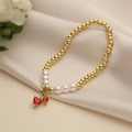 Bracelet en perles dorées avec pendentif cerise en cristal rouge sur soie beige élégante - E000417YS-Cerise en Cristal Rouge en Forme de Cœur