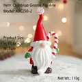 Mini gnome de Noël en résine avec sucre d'orge et arrière-plan festif chaleureux - Gnome Père Noël à Longue Barbe