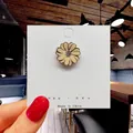 Cute yellow daisy enamel brooch with sparkling crystal center on a white display card - 59*Yellow Daisy Flower Pin