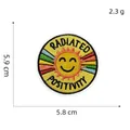 Colorful sun embroidery patch with Radiated Positivity quote measuring 5.9x5.8cm - Gold Sun Radiated Positivity Patch