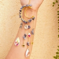 Golden moon suncatcher with blue stones, stars and crystal prisms hanging on an arm - K2 Blue Spot with Octagonal Beads & Crystal Teardrop