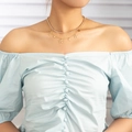 Close-up of double-layered gold necklace with sparkling star charms and crystal tennis chain - Gold Smiling Star (NZ1275)