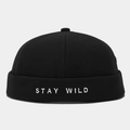 Minimalist black docker hat with white Stay Wild embroidery in canvas fabric - Adjustable / Black