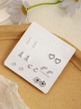 Detailed close-up of 7-pair alloy stud earring set with heart and star shapes - Mixed Color Tower Flower Stars (FX885-16)