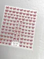 Adhesive nail art stickers featuring elegant red ribbon bow designs for manicure decor - Aha-9306 Red Bows