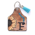 Western leather ear tag keychain with letter F, sunflower print and blue tassel - Letter F