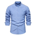 Detail of light blue Oxford shirt featuring grey contrast collar and shoulder stitching - Lake Blue