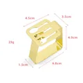 Leaf-shaped golden stainless steel tablecloth clip with silverware cutout design - Tableware / Gold