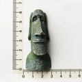 Detailed view of resin Moai statue souvenir with moss texture and size measurement - Easter Island Moai