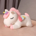 Weißes Einhorn Kuscheltier in schlafender Pose mit rosa Mähne und buntem Regenbogenhorn - Weißes Einhorn / 25cm(0.1kg)