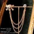 Gothic skull collar chain brooch with gold tassels and crystals on vintage display stand - Gold Skull Style (TL24050)