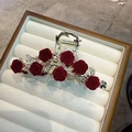 Detailed view of golden shark hair clip featuring velvet roses and rhinestone leaf accents - 1# Red Flower