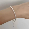 Detail of silver snake chain bracelet on wrist with adjustable extension and pendant - Silver Minimalist Snake Extension Chain (MY31858)