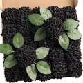Close-up of artificial black dahlias and green leaves inside a shipping box - Black