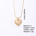 Golden heart pendant necklace with letter F and sparkling crystals on white background - Letter F