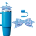 Close-up of blue glitter bow straw topper and large bow accessories for tumbler cups - Blue