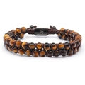 Close-up of double-row tiger eye stone bracelet with woven cord and engraved metal plate - Tiger's Eye