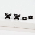 Macro view of French vintage butterfly stud earrings set in matte black stainless steel - Butterfly Style (176) / Black