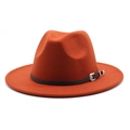 Close-up of rust red wool fedora with brown leather band and silver vintage buckle - M (56-58cm) / Rust red