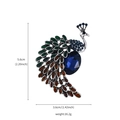 Elegant silver peacock brooch with blue and green crystals measuring 5.6cm by 3.6cm - Silver Blue Green Rhinestone Peacock